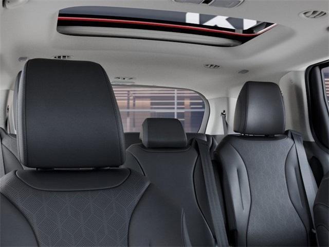 Photo of 2026 Flare Red Kia Carnival Hybrid