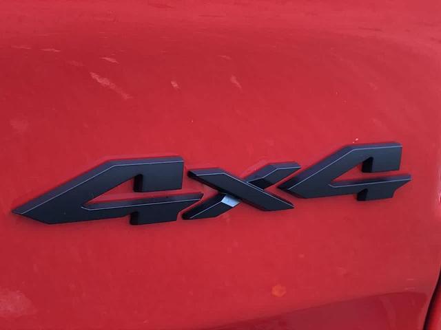 Photo of 2025 Flame Red Clearcoat RAM 1500