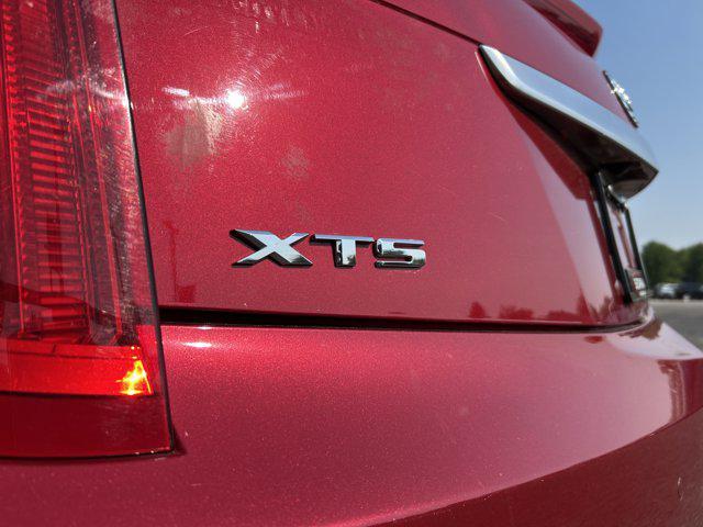 Photo of 2013 Crystal Red Tintcoat Cadillac XTS