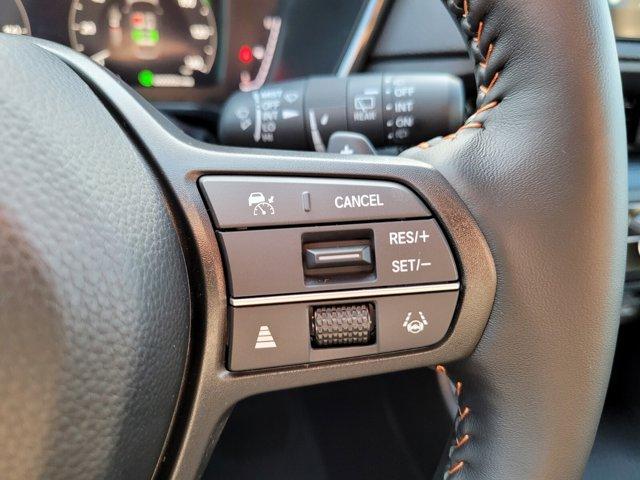 Photo of 2026 Radiant Red Metallic Honda CR-V Hybrid
