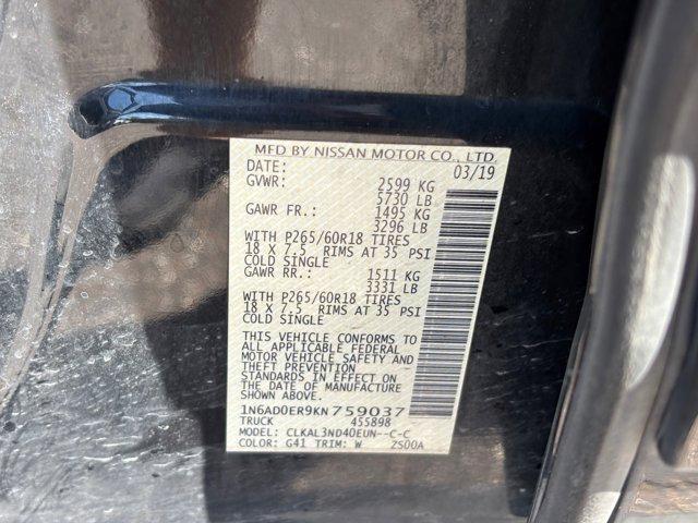 Photo of 2019 Magnetic Black Pearl Nissan Frontier