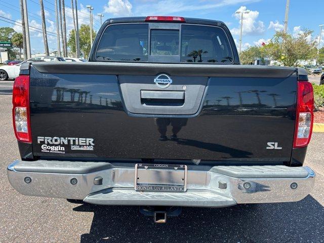 Photo of 2019 Magnetic Black Pearl Nissan Frontier