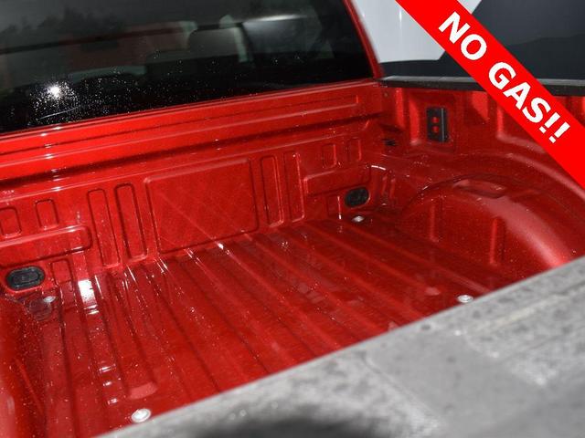 Photo of 2025 Red Metallic Ford F-150 Lightning
