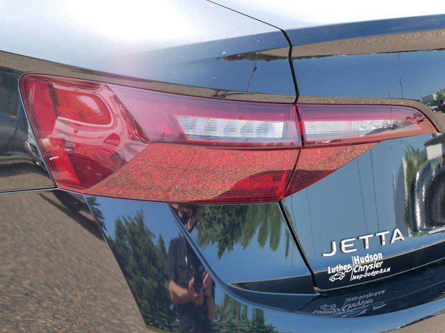 Photo of 2024 Deep Black Pearl Volkswagen Jetta