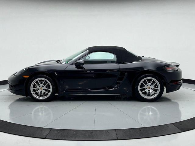 Photo of 2024 Jet Black Metallic Porsche 718 Boxster