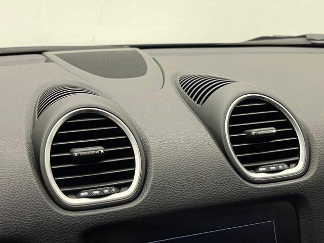 Photo of 2024 Jet Black Metallic Porsche 718 Boxster