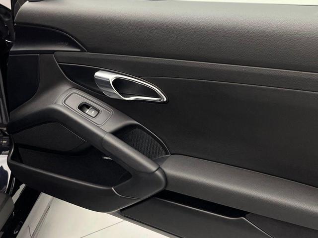 Photo of 2024 Jet Black Metallic Porsche 718 Boxster