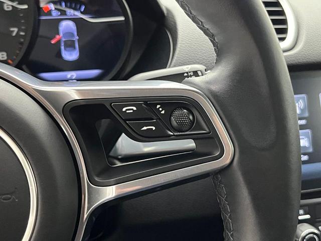 Photo of 2024 Jet Black Metallic Porsche 718 Boxster