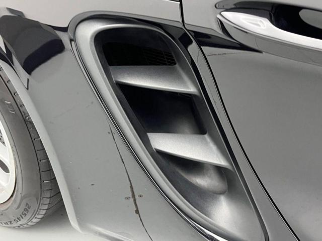 Photo of 2024 Jet Black Metallic Porsche 718 Boxster