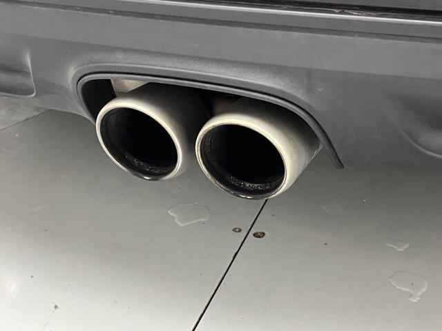 Photo of 2024 Jet Black Metallic Porsche 718 Boxster