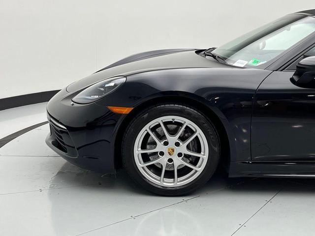 Photo of 2024 Jet Black Metallic Porsche 718 Boxster