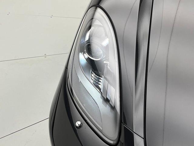 Photo of 2024 Jet Black Metallic Porsche 718 Boxster