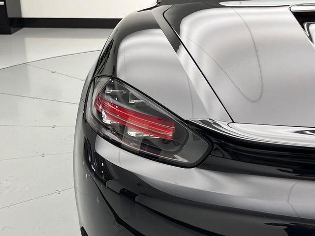 Photo of 2024 Jet Black Metallic Porsche 718 Boxster