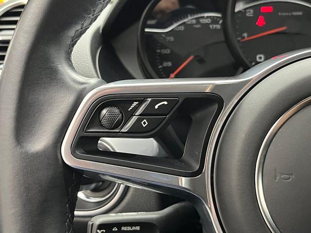 Photo of 2024 Jet Black Metallic Porsche 718 Boxster