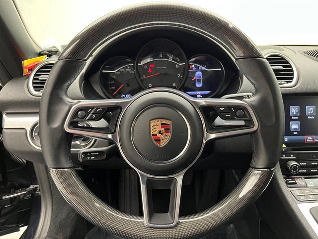 Photo of 2024 Jet Black Metallic Porsche 718 Boxster