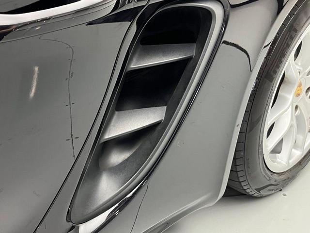 Photo of 2024 Jet Black Metallic Porsche 718 Boxster