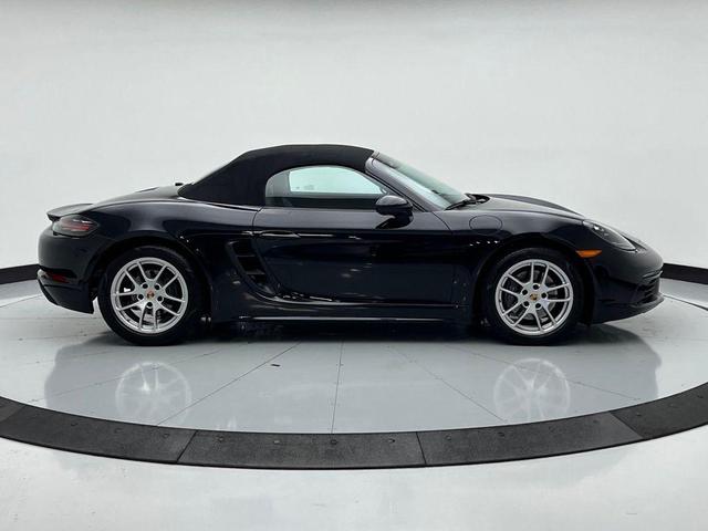 Photo of 2024 Jet Black Metallic Porsche 718 Boxster