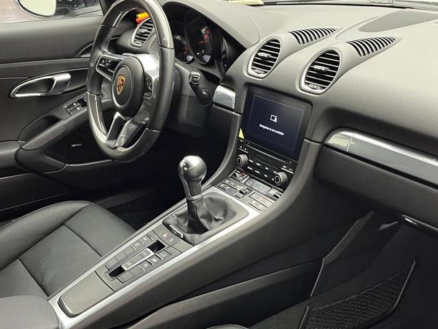 Photo of 2024 Jet Black Metallic Porsche 718 Boxster