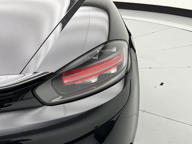 Photo of 2024 Jet Black Metallic Porsche 718 Boxster