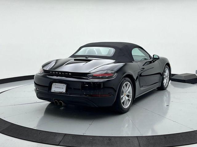Photo of 2024 Jet Black Metallic Porsche 718 Boxster
