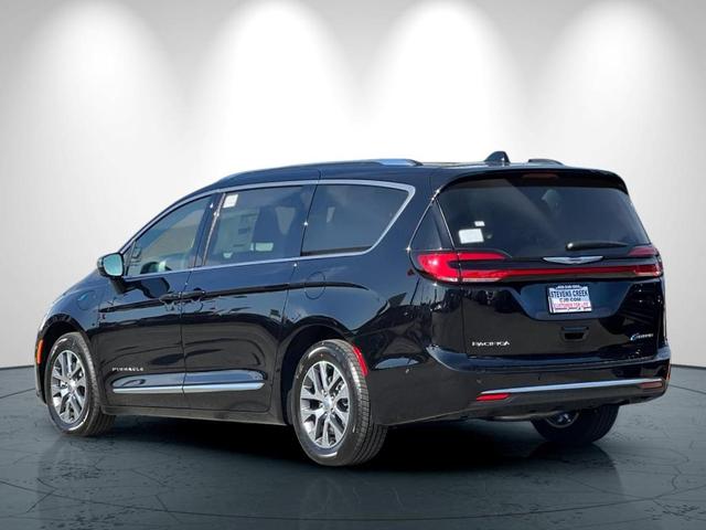 Photo of 2025 Diamond Black Chrysler Pacifica Hybrid