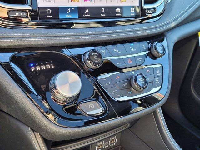 Photo of 2025 Red Chrysler Pacifica Hybrid