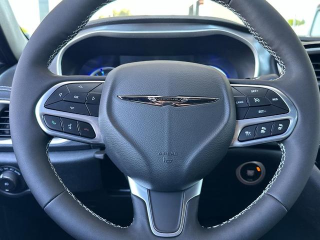 Photo of 2025 Red Chrysler Pacifica Hybrid