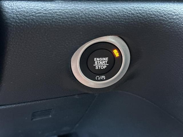 Photo of 2025 Red Chrysler Pacifica Hybrid