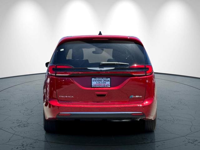 Photo of 2025 Red Chrysler Pacifica Hybrid