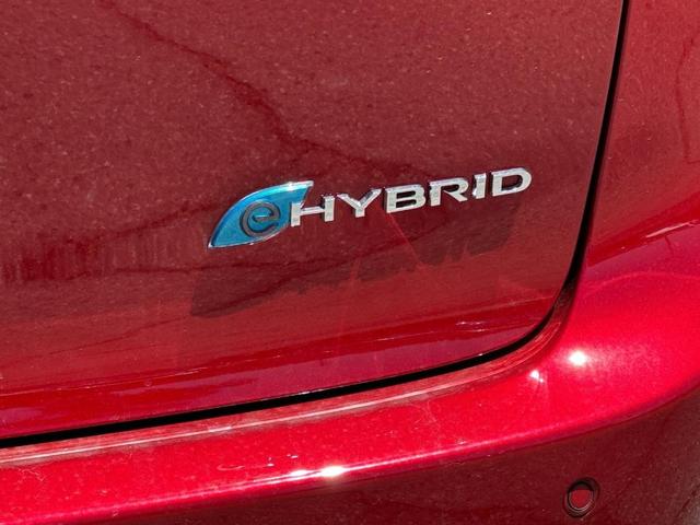Photo of 2025 Red Chrysler Pacifica Hybrid