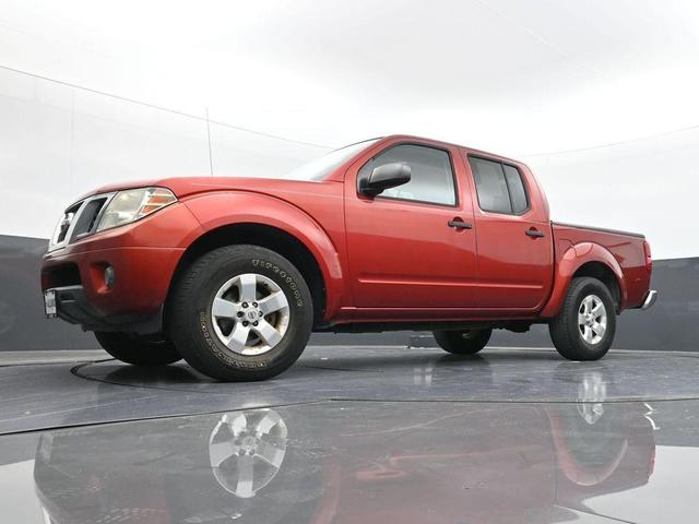 Photo of 2012 Lava Red Nissan Frontier