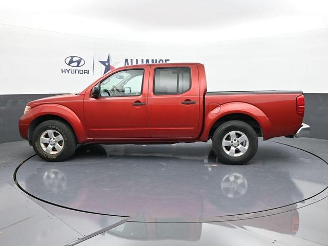 Photo of 2012 Lava Red Nissan Frontier