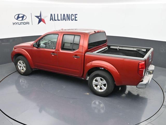 Photo of 2012 Lava Red Nissan Frontier