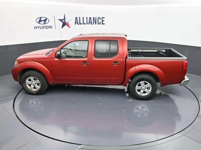 Photo of 2012 Lava Red Nissan Frontier
