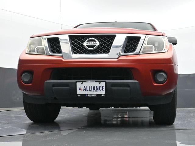 Photo of 2012 Lava Red Nissan Frontier