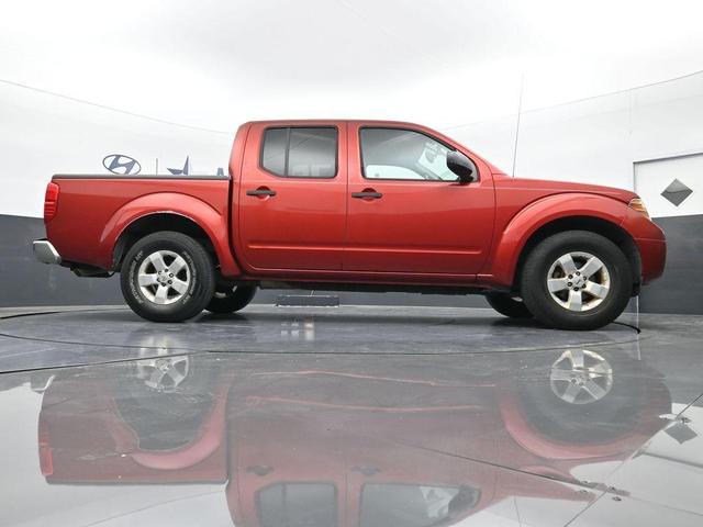 Photo of 2012 Lava Red Nissan Frontier