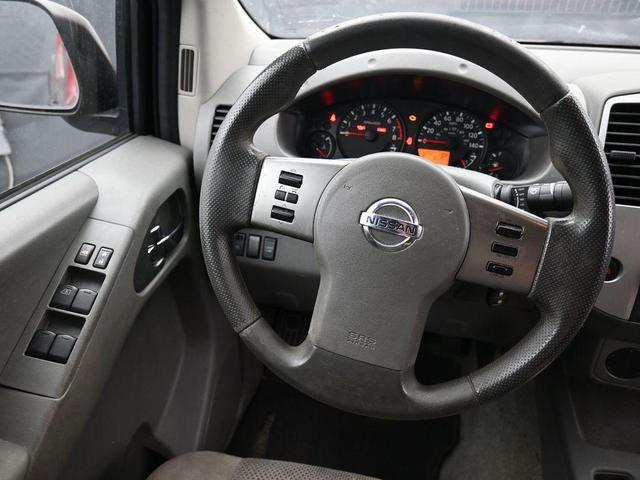 Photo of 2012 Lava Red Nissan Frontier