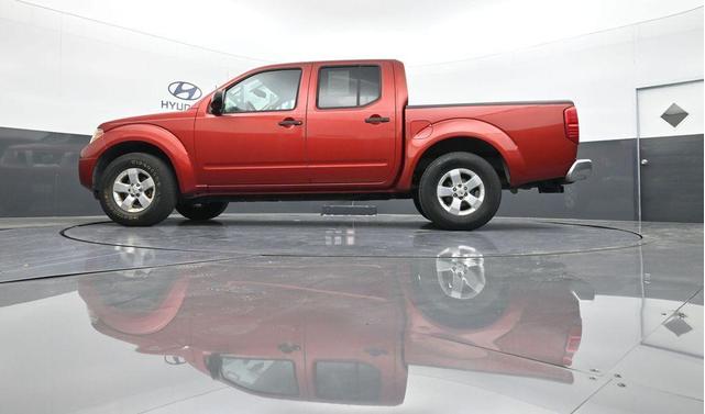 Photo of 2012 Lava Red Nissan Frontier