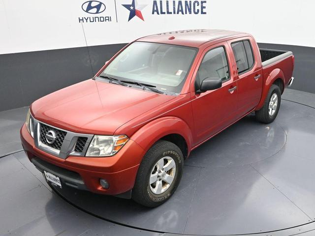 Photo of 2012 Lava Red Nissan Frontier