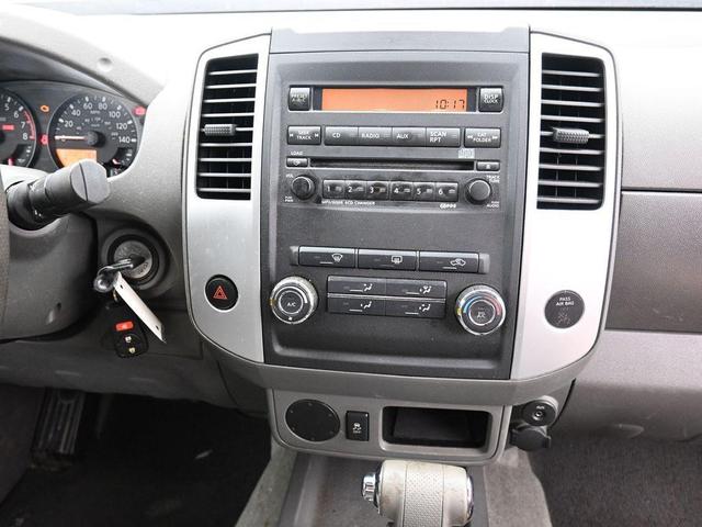 Photo of 2012 Lava Red Nissan Frontier