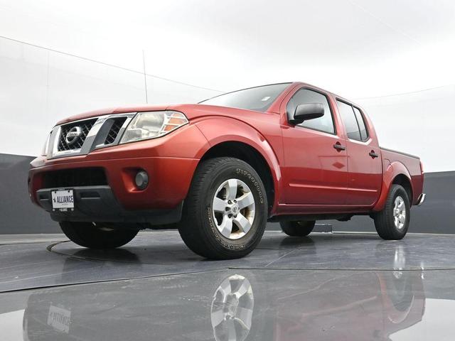 Photo of 2012 Lava Red Nissan Frontier
