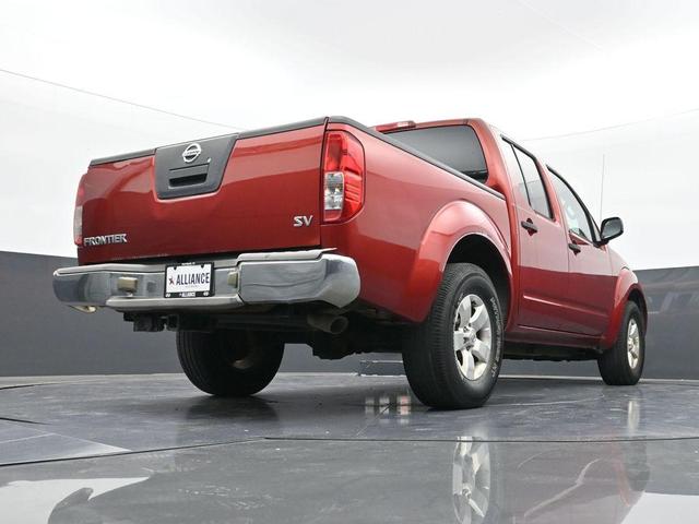 Photo of 2012 Lava Red Nissan Frontier