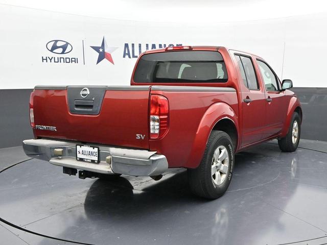 Photo of 2012 Lava Red Nissan Frontier