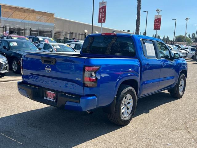 Photo of 2024 Bluestone Pearl Nissan Frontier