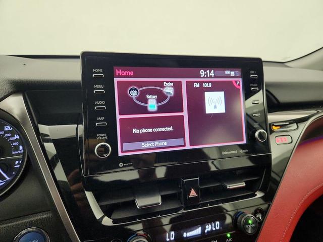Photo of 2021 White Toyota Camry Hybrid