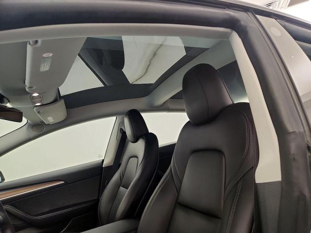 Photo of 2023 White Tesla Model 3