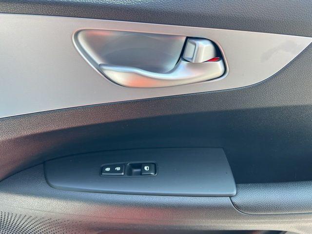Photo of 2023 Fire Orange Kia Forte