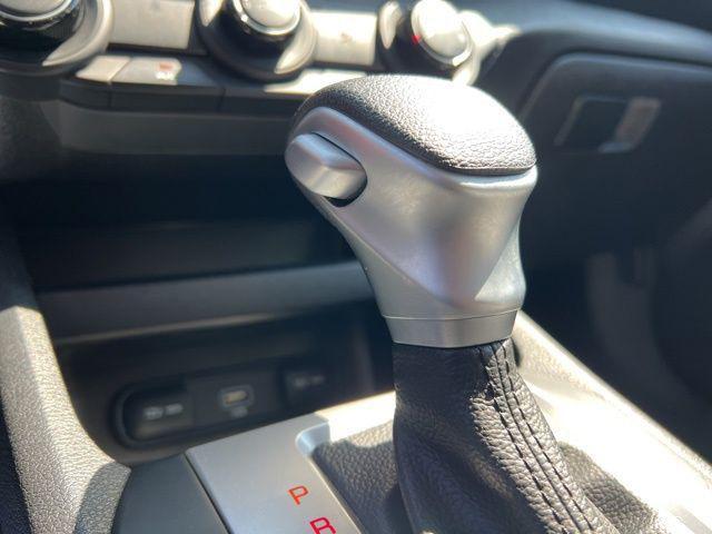 Photo of 2023 Fire Orange Kia Forte