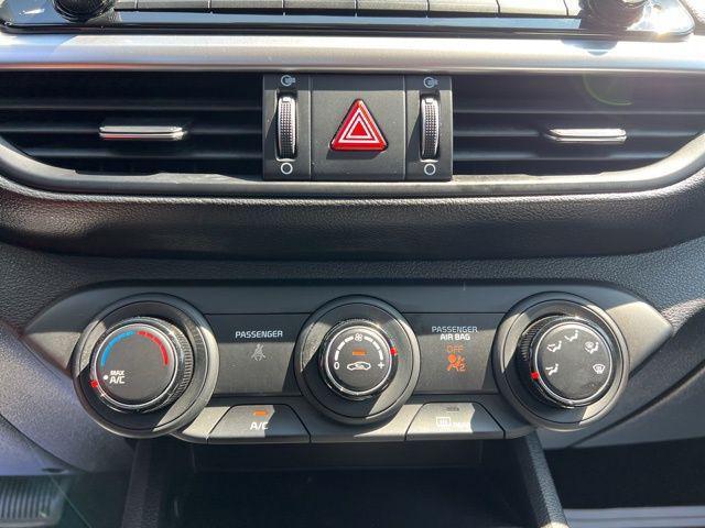 Photo of 2023 Fire Orange Kia Forte