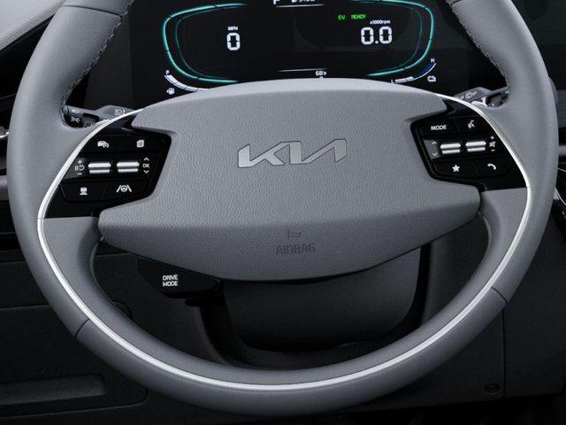Photo of 2025 Cityscape Green Kia Niro